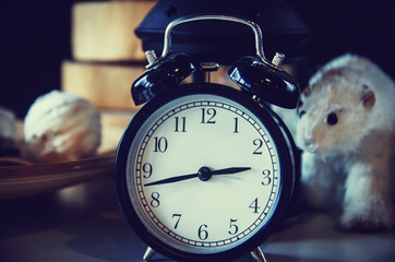 Retro alarm clock  on wood table