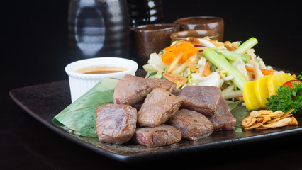 japanese cuisine. beef cube on the background