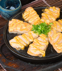 japanese cuisine. hot plate fish on the background