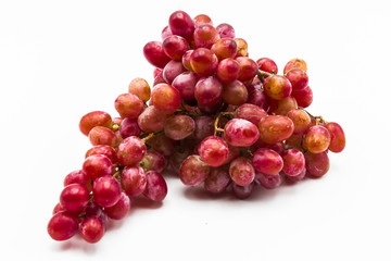 Bunch of grapes without seeds on white background.