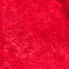 Red velvet texture background part of Christmas Santa Claus fashion clothing costume and hat 