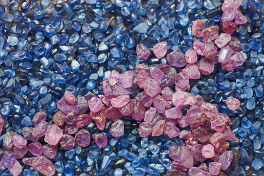 Natural mineral gem stones supphirus on the background and measure stuff
