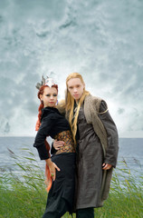red-haired woman and a man on the beach. Fabulous image.