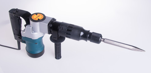 Hammer drill. Hammer drill on the background