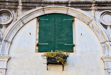Fototapeta na wymiar Decorated Italian Window