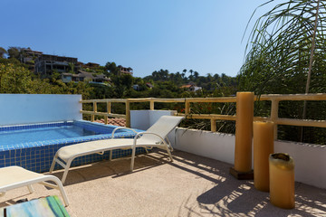 Roof top swimming pool and sun chair overlooking Sayulita