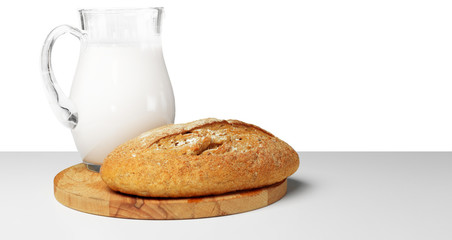 Bread and milk on the table