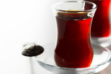 Turkish tea in traditional glass isolated on white background