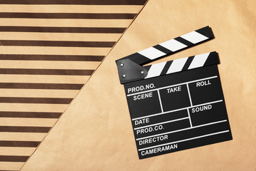 Film clapper board on a table