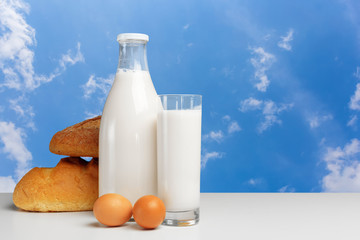 Bread and milk on the table