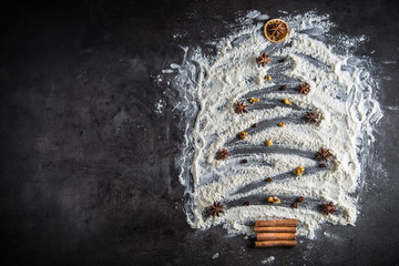 Christmas Tree. Christmas tree from flour with ornaments anise star wamnuts coffee beans and...