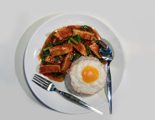 Artificial Thai spicy food basil pork fried rice recipe with fried egg
