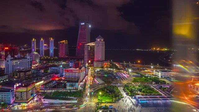 night illuminated zhuhai city gongbei port of entry square rooftop reflection panorama 4k timelapse china
