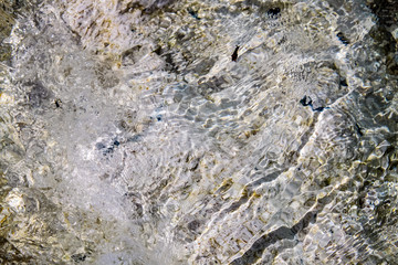 colored stones below sea level near the coast of the Mediterranean Italian island of Elba
