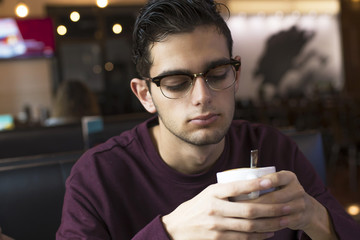 modern young man drinking coffee