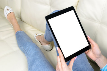 Woman hands holding and using tablet computer with isolated white screen. Blank empty screen. Copy Space for text. Isolated white screen