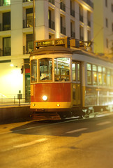 Naklejka na ściany i meble Famous Lisbon tram on the street.