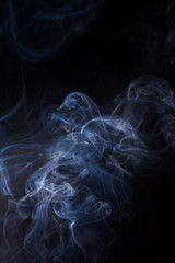 Smoke on a black background.
