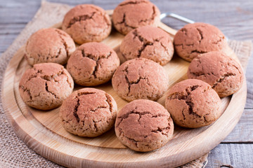 Fototapeta na wymiar Cookies Chocolate crinkles on a cutting board