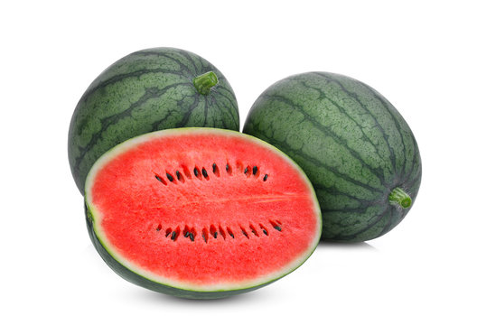 two whole and half of red watermelon isolated on white background