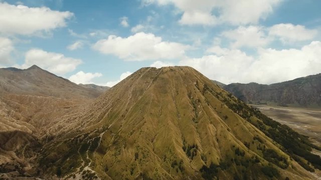 Volcano in the mountains in East Jawa, Indonesia. Aerial view of volcano crater,Tengger Semeru National Park. 4K video. Aerial footage.