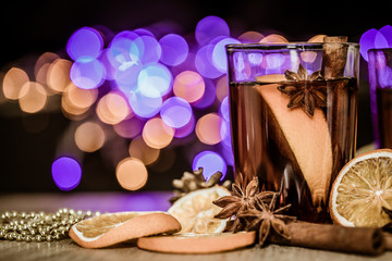 Mulled wine in night celebration of  New Year party and delicious a Christmas drink for autumn and winter season