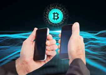 Hands holding phones with bitcoin icons