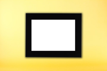 Black photo frame in yellow background