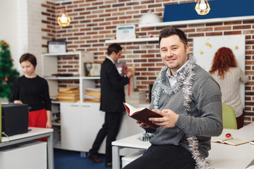 Smiling man portrait looking to camera ready for Christmas