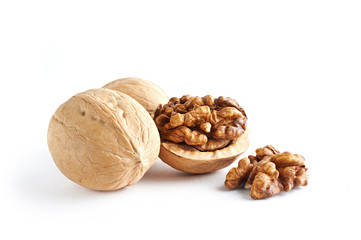 Walnuts and walnuts kernels isolated on white background