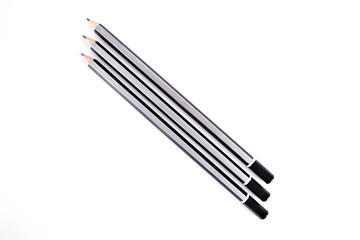 Black pencil isolated on white background