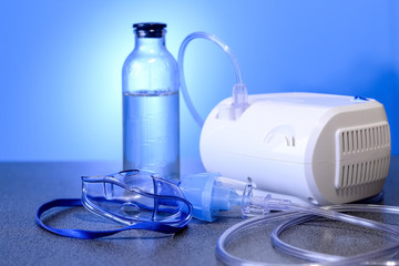 Medical nebulizer for the treatment of bronchitis. Camera agains