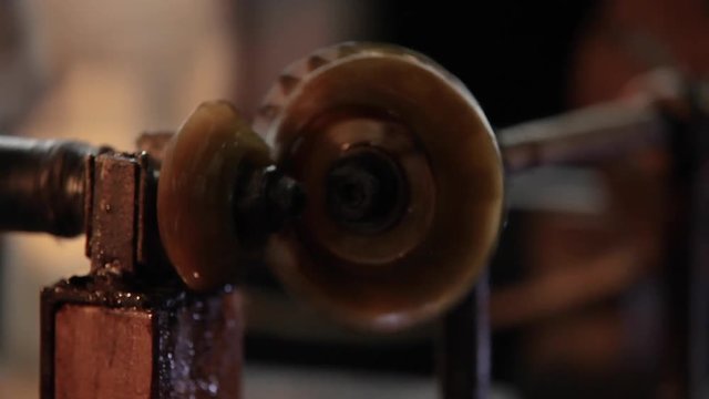 Greasy gear rotating fast, Gears working detail, vintage machinery