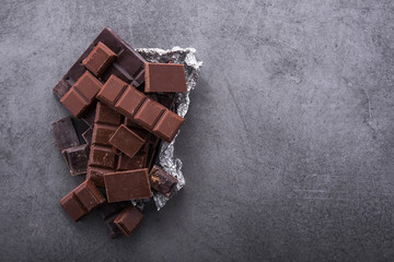 Dark chocolate bar on a stone