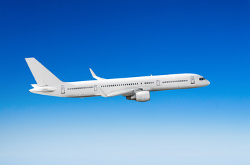 Fototapeta na wymiar Passenger white airplane on the side view, flies on a flight level sky.