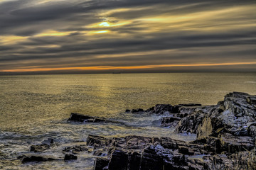 Fototapeta na wymiar Maine rocky coast at dawn