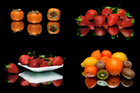 fresh juicy fruit and berries on a black background