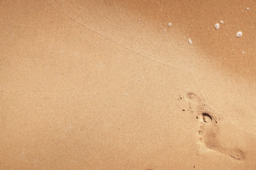 Fototapeta na wymiar Foot print on a beach
