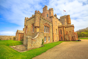 Fototapeta premium Castle of Mey or Barrogill castle near Thurso and John o' Groats on north coast of the Highland in Scotland, United Kingdom on a sunny day. Popular landmark and famous touristic attraction.