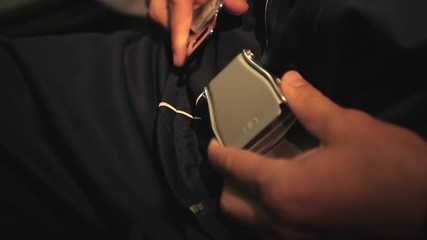 The man fastens the seat belt on the plane, close-up. HD, 1920x1080. slow motion.