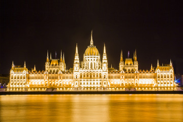 Fototapeta premium Beautiful view of the Hungarian Parliament building on the Danube embankment in Budapest, Hungary