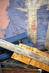 Close-up of pile of old wooden boards and slats