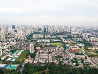 Naklejka na ściany i meble Skyscraper of Bangkok business district with gree park