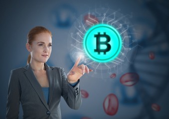 Businesswoman touching bitcoin graphic icon