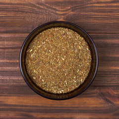 Spice mix - garlic, dill, basil, marjoram, oregano, savory, coriander, paprika, chili, nutmeg, ucco-suneli in a bowl