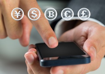 Currency icons and hand touching phone