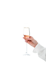 cropped view of female hand with glass of champagne, isolated on white