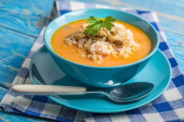 Tomato soup with rice.