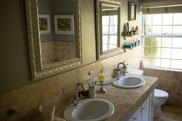 Mirror over sinks in bathroom
