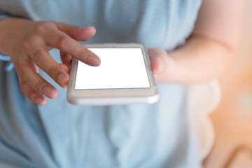 Close up of female hand using smartphone